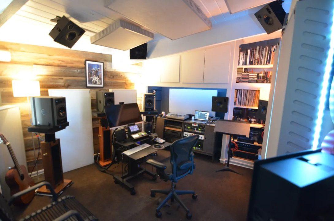 Matt Boudreau’s mixing room, with speakers on stands and more mounted overhead for Dolby Atmos.