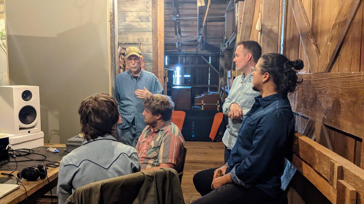 John Cuniberti talking with the band Ismay in the control room of the barn during the OneMic session.