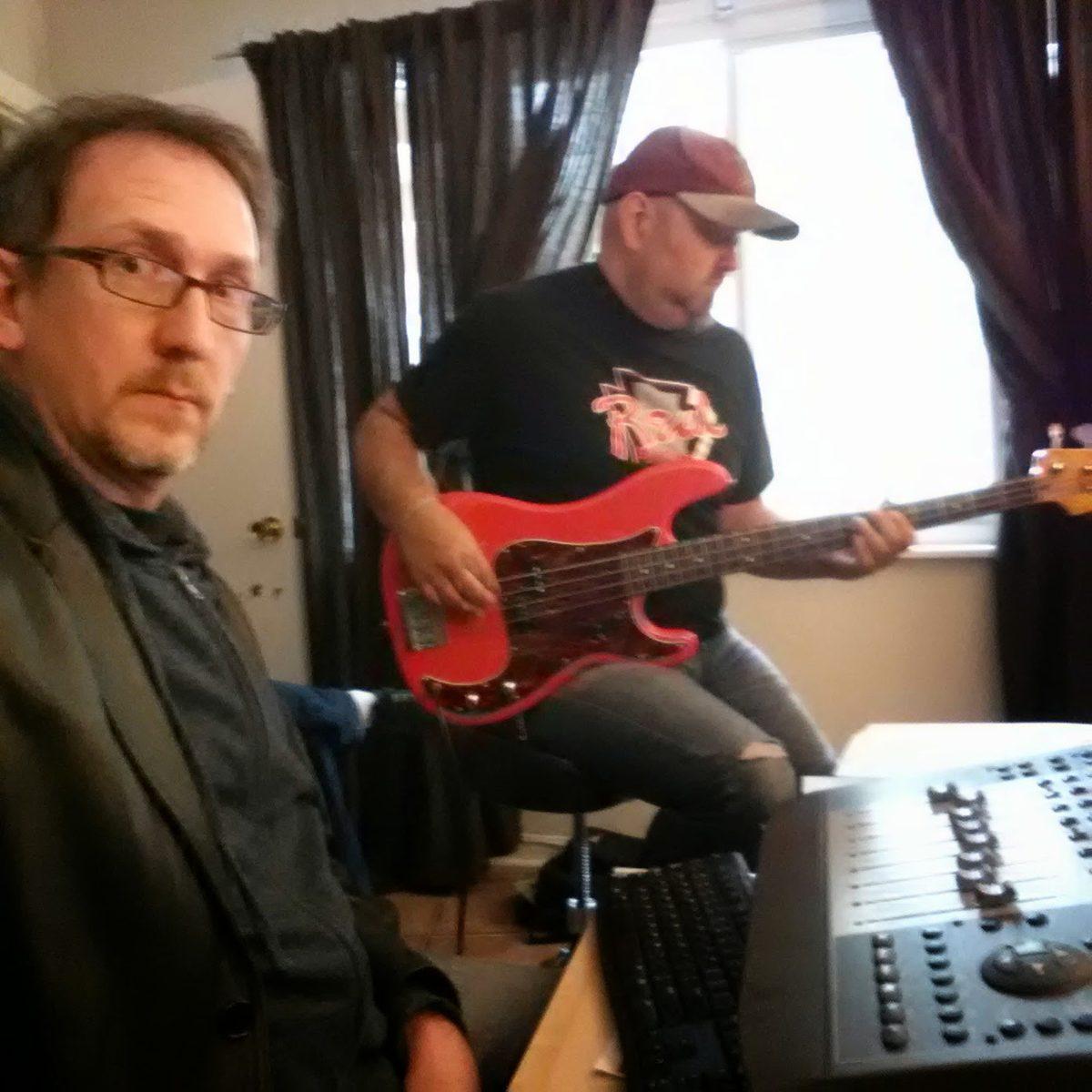 Matt Boudreau recording bassist Kevin White at his home studio.
